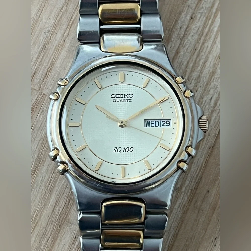 Seiko SQ 100 Rare Vintage Men’s Watch Light Gold-Tone Dial Two-Tone Bracelet